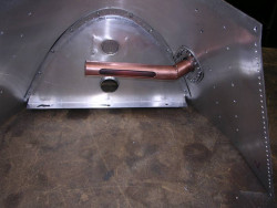 Feed pipe below fill baffle