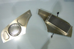 Engine bay panel with hidden fan to draw heat out and second panel with radiator for turbo and two hidden fans