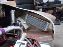 Engine bay panel with radiator for turbo and two hidden fans