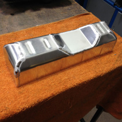 Forming replica radiator top tank.