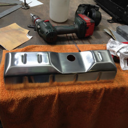 Forming replica radiator top tank.