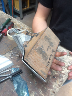 Knocking block for shaping end tanks