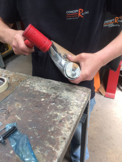 Knocking blocks for end tank manufacture