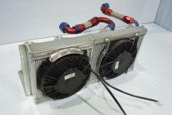 Oil cooler - radiator combination with air duct and fans