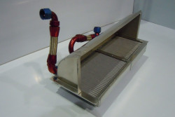 Oil cooler - radiator combination with air duct and fans